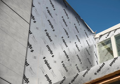 Construction of a multi-story building enclosure in progress