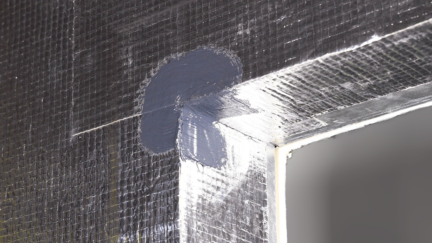 Commercial building being constructed using AWBs with reinforced corner